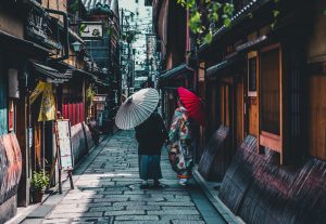 women-holding-umbrellas450