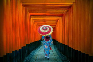 Asian women in traditional japanese kimonos at Fushimi Inari Shr